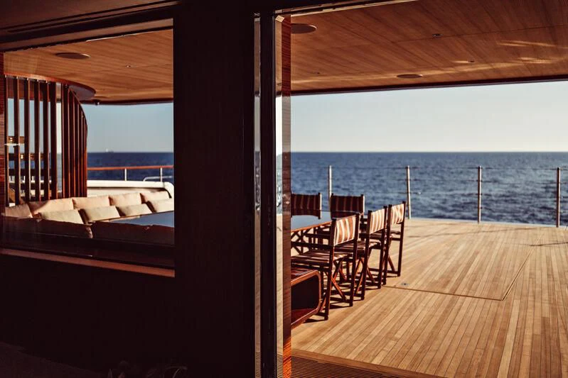 a deck with a view of the ocean aboard ARTEXPLORER Yacht for Sale