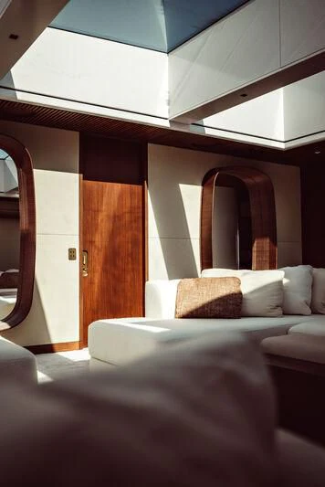 a couch in a room aboard ARTEXPLORER Yacht for Sale