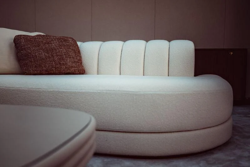 a couch with pillows aboard ARTEXPLORER Yacht for Sale