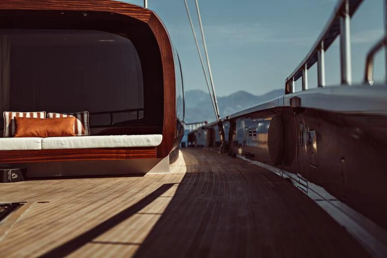 a dog sits on a boat aboard ARTEXPLORER Yacht for Sale