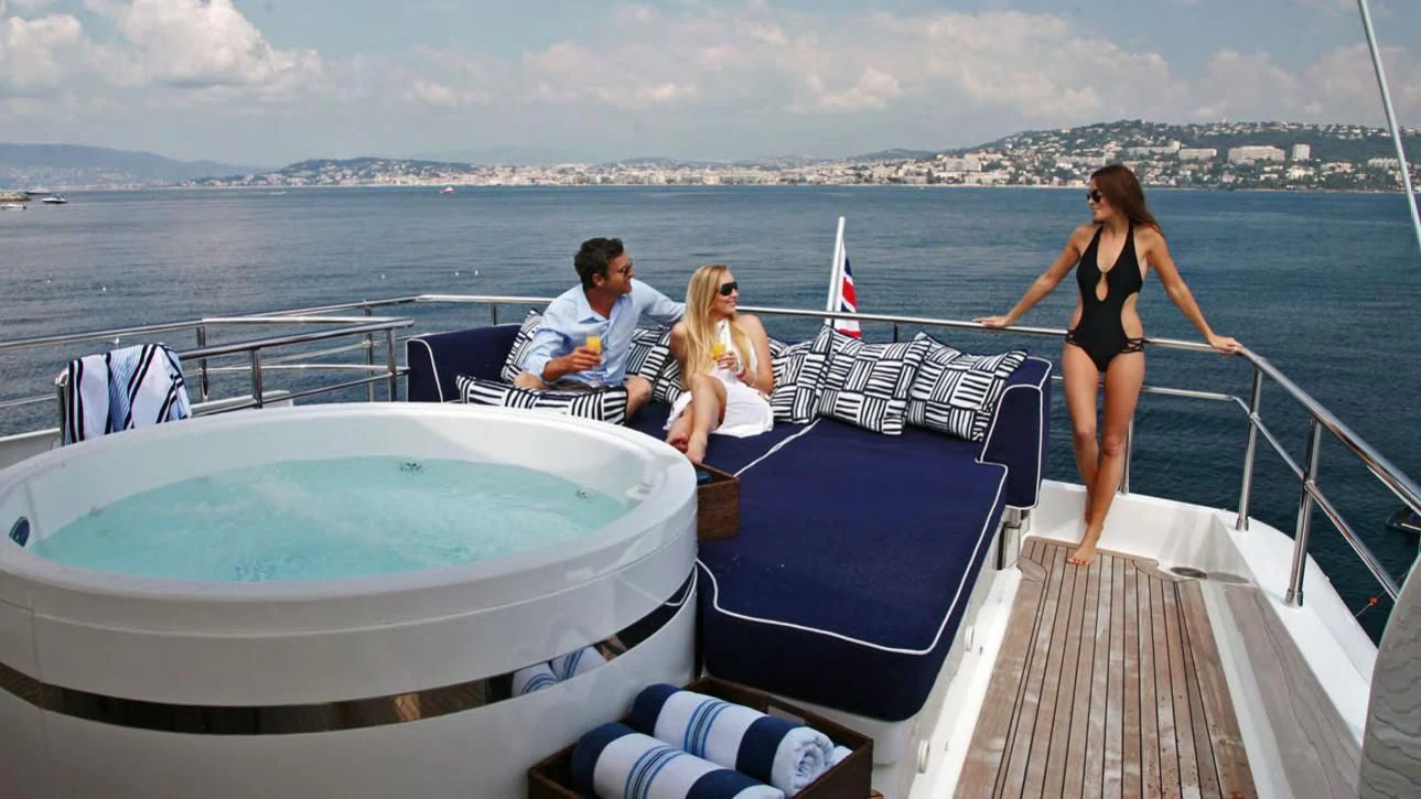 a group of people on a boat aboard ASHA Yacht for Sale