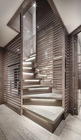 a set of wooden stairs aboard REINE D'AZUR Yacht for Sale