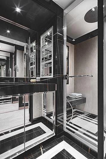 a bathroom with a large glass shower aboard REINE D'AZUR Yacht for Sale