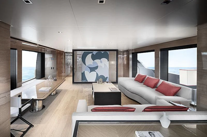 a living room with a large screen aboard REINE D'AZUR Yacht for Sale