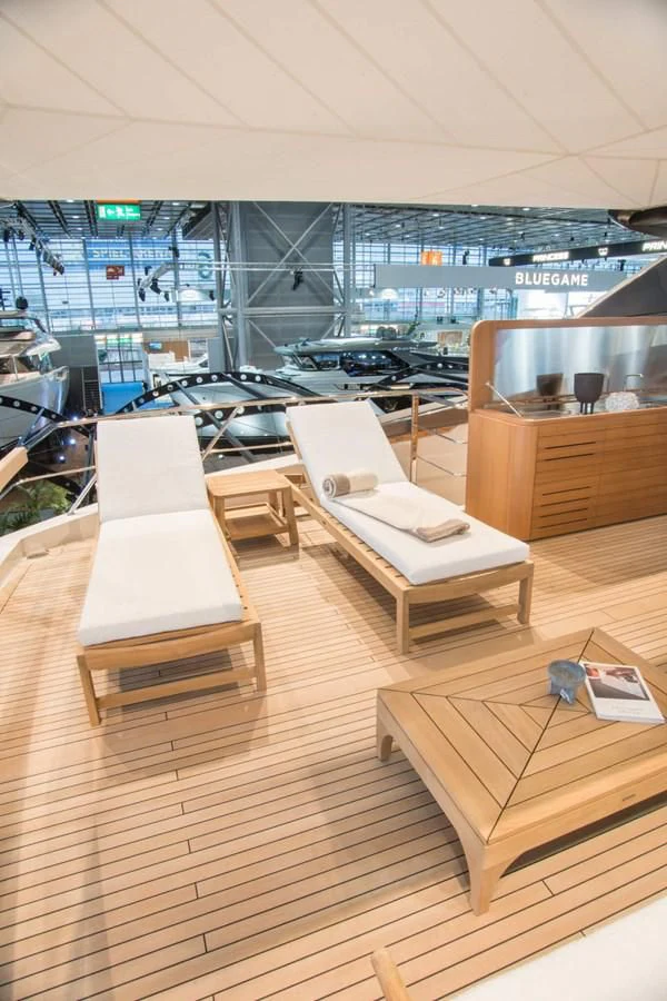 a room with tables and chairs aboard REINE D'AZUR Yacht for Sale