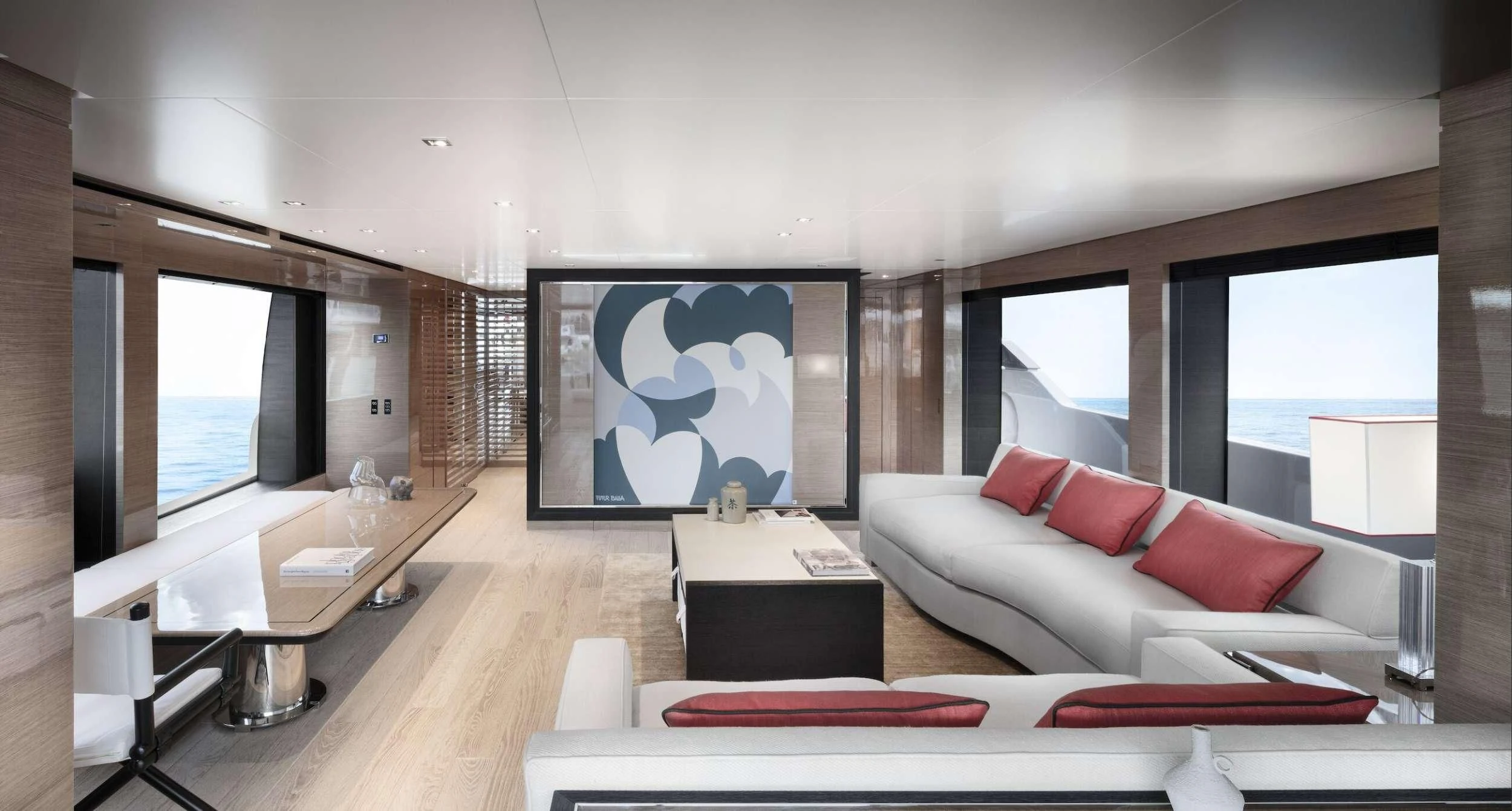 a living room with a large screen aboard REINE D'AZUR Yacht for Sale