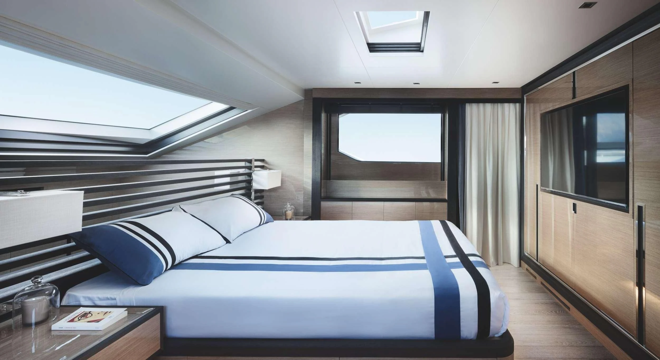 a bed in a room aboard REINE D'AZUR Yacht for Sale