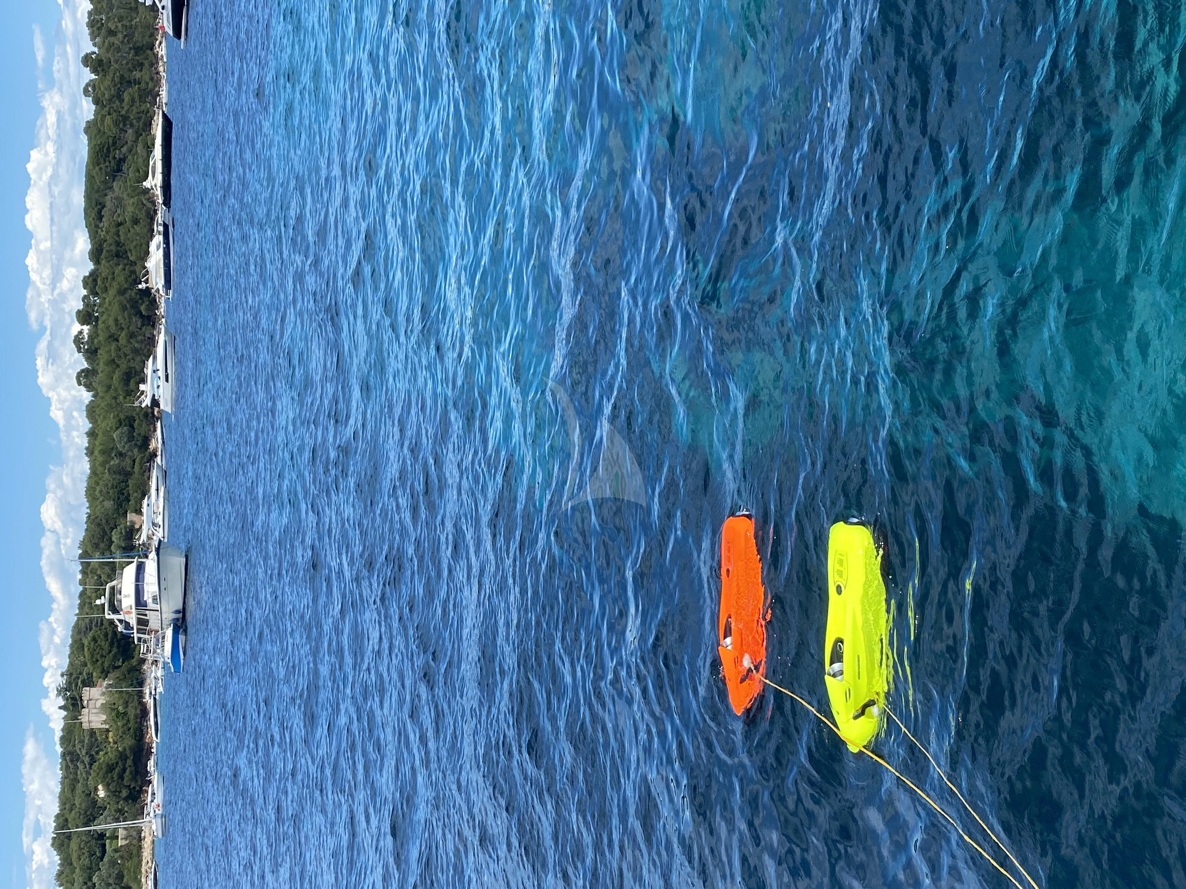 a yellow kayak on a river aboard REINE D'AZUR Yacht for Sale