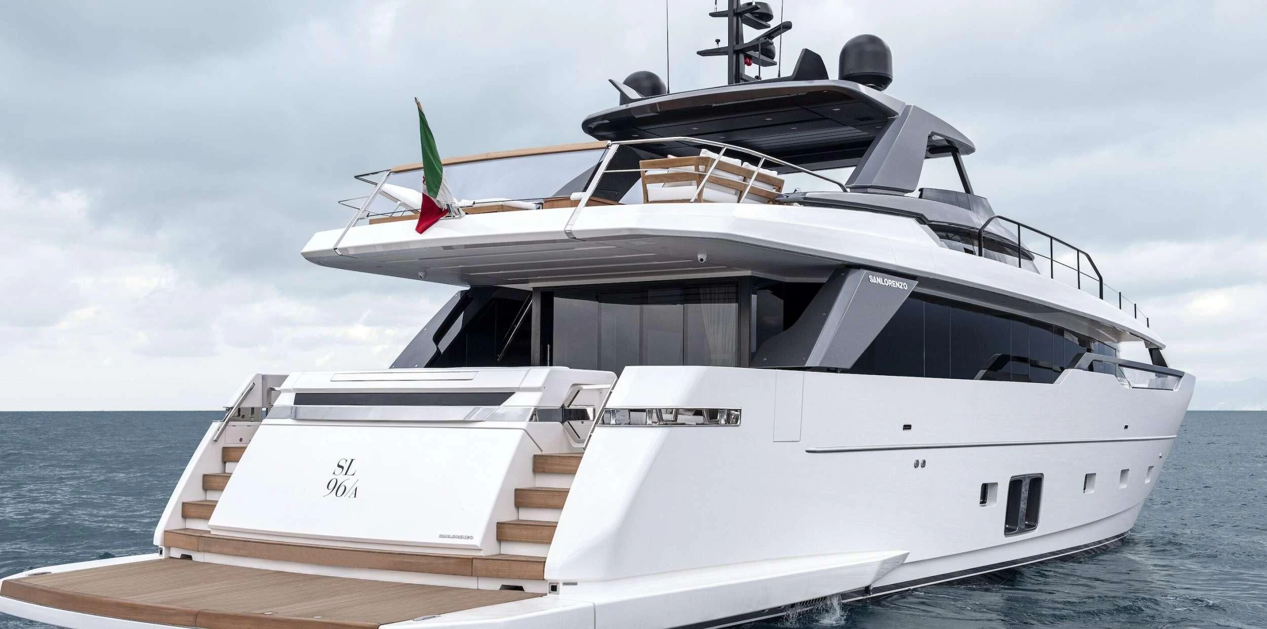 a white yacht on the water aboard REINE D'AZUR Yacht for Sale