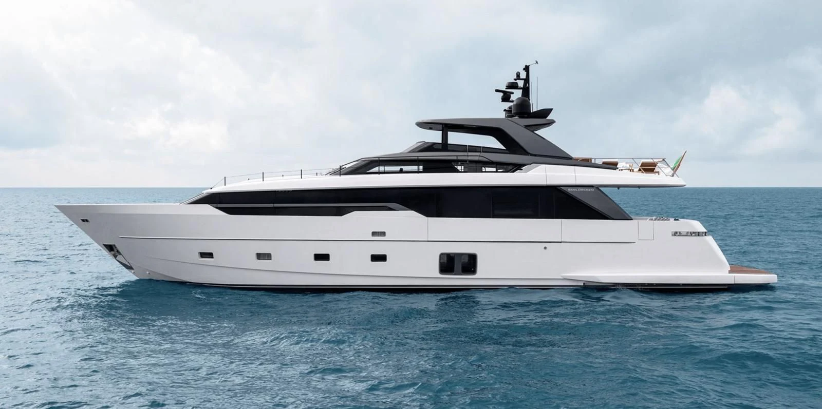 a white yacht in the water aboard REINE D'AZUR Yacht for Sale