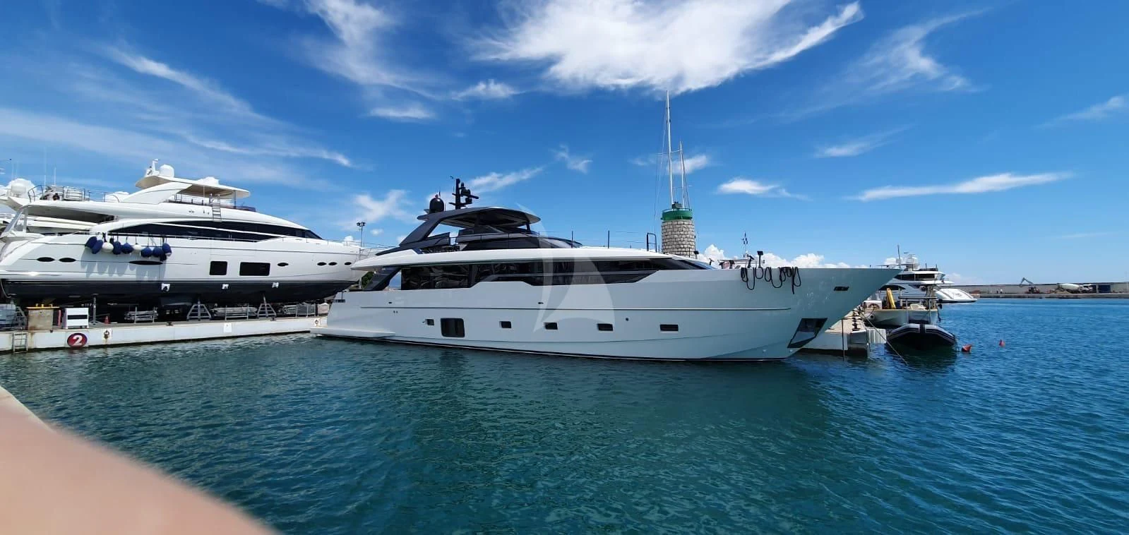 a group of boats in a harbor aboard REINE D'AZUR Yacht for Sale