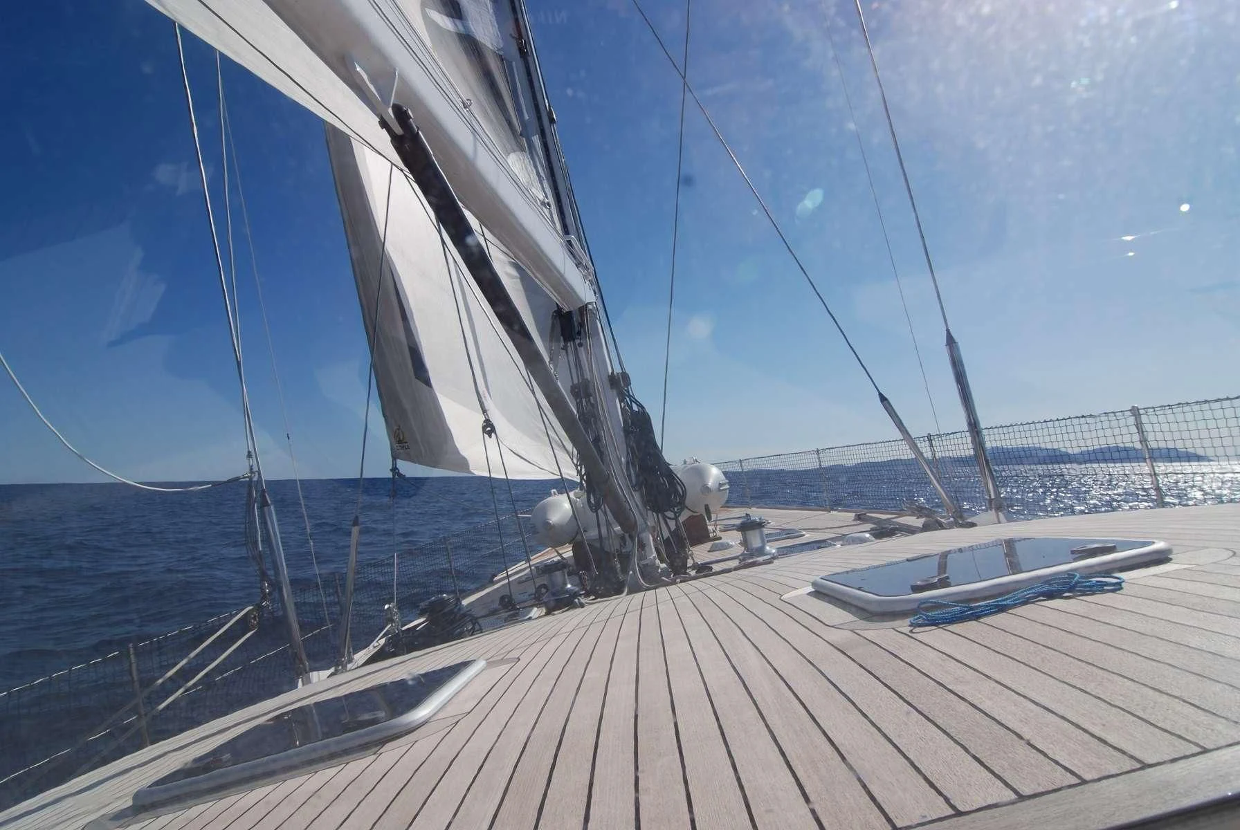 a sailboat on a deck aboard NOHEEA Yacht for Sale