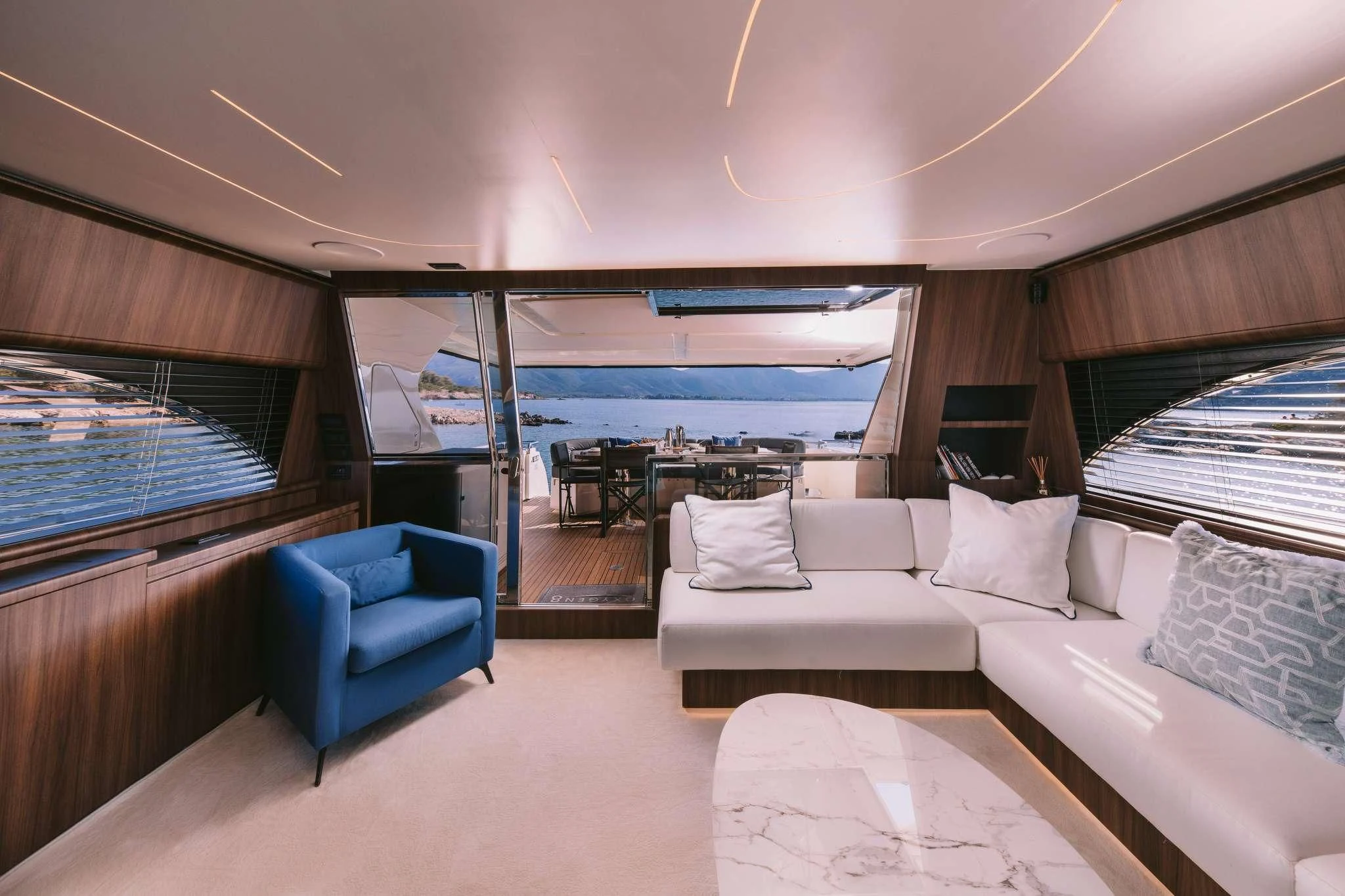 a room with a view of the ocean and the ocean aboard OXYGEN 8 Yacht for Charter