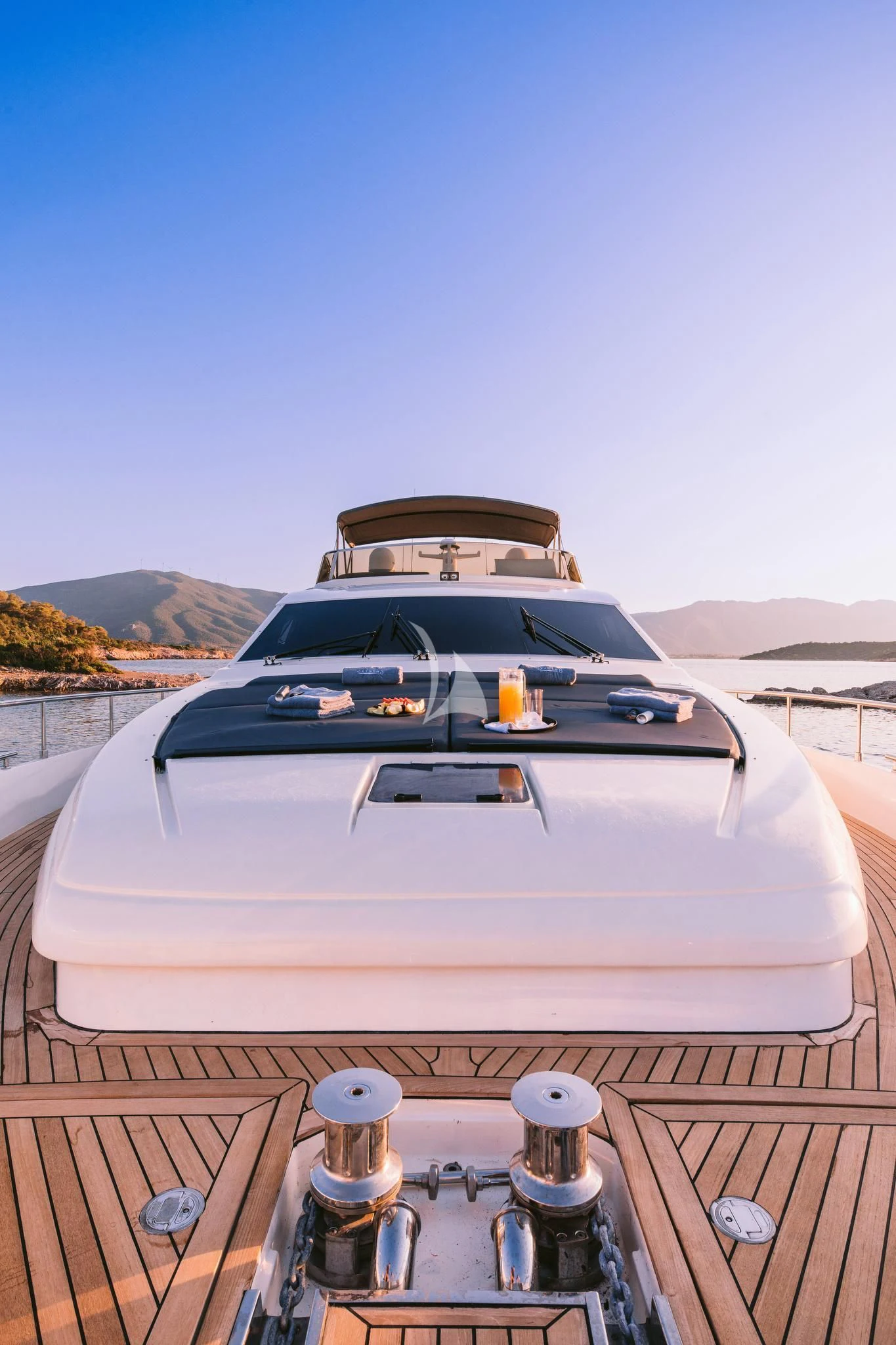a white convertible car with a large antenna on top of it aboard OXYGEN 8 Yacht for Charter