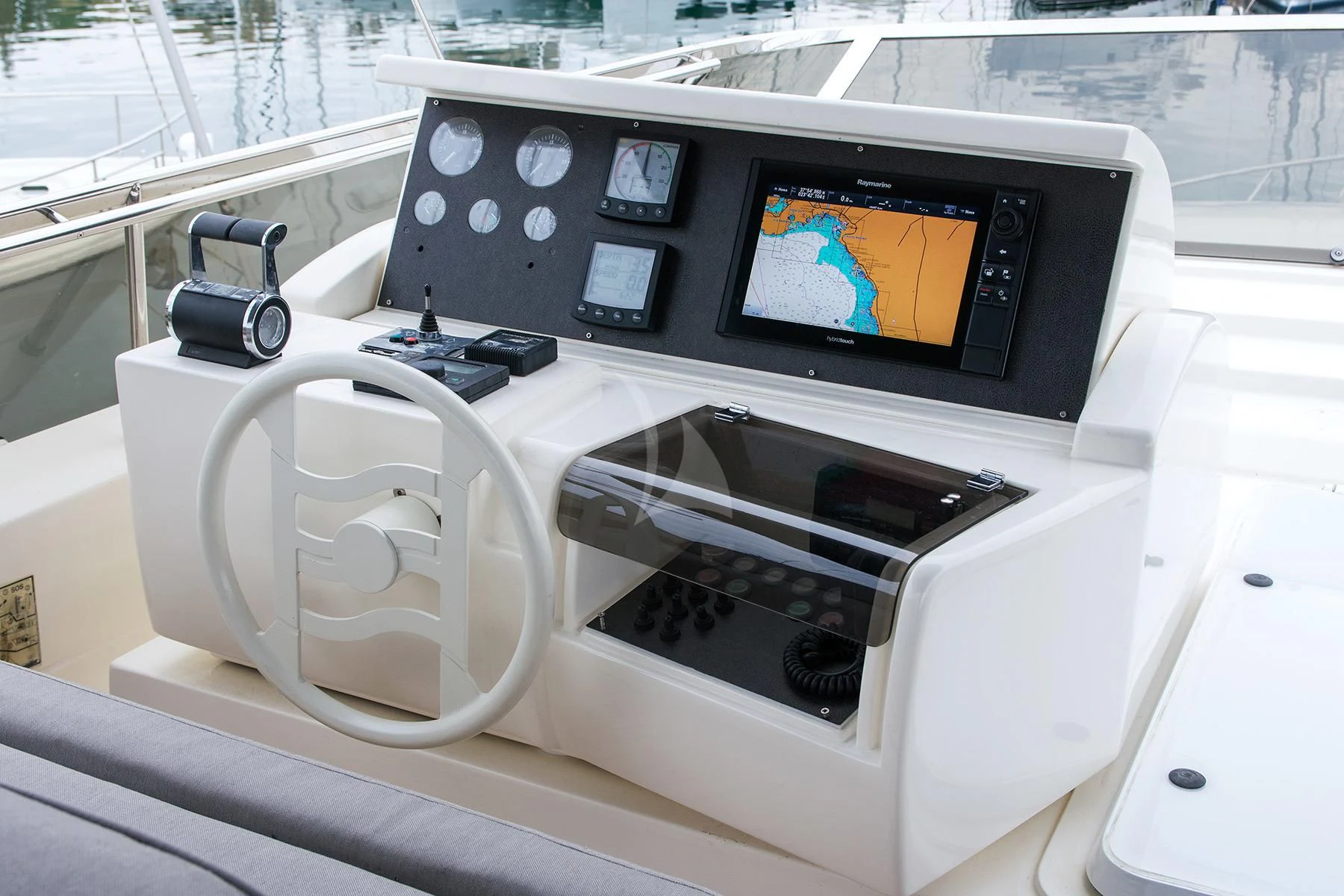 a white machine with a screen aboard OXYGEN 8 Yacht for Charter