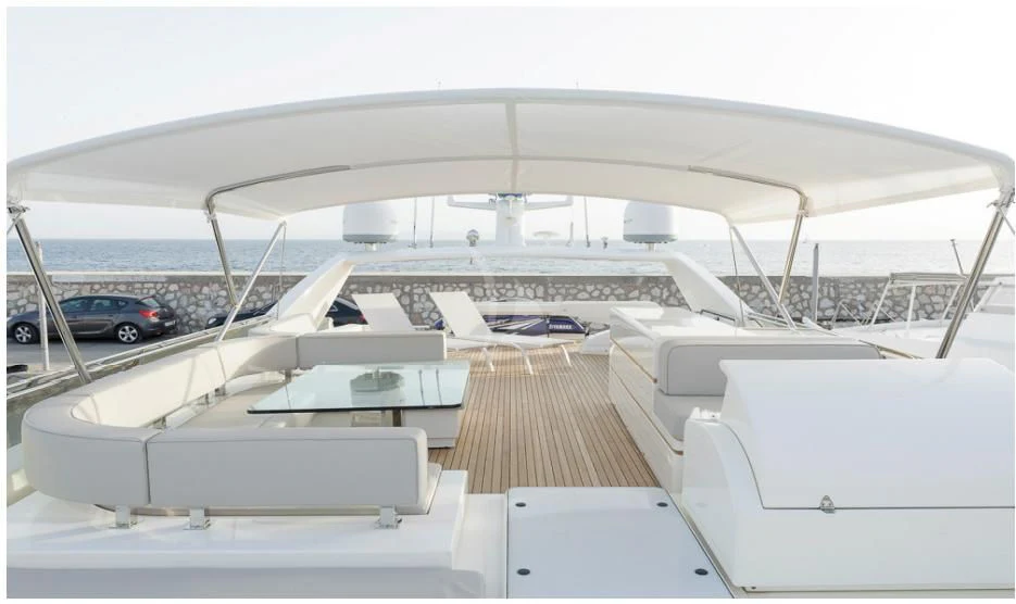 a boat with a deck and a deck with cars parked on it aboard OXYGEN 8 Yacht for Charter