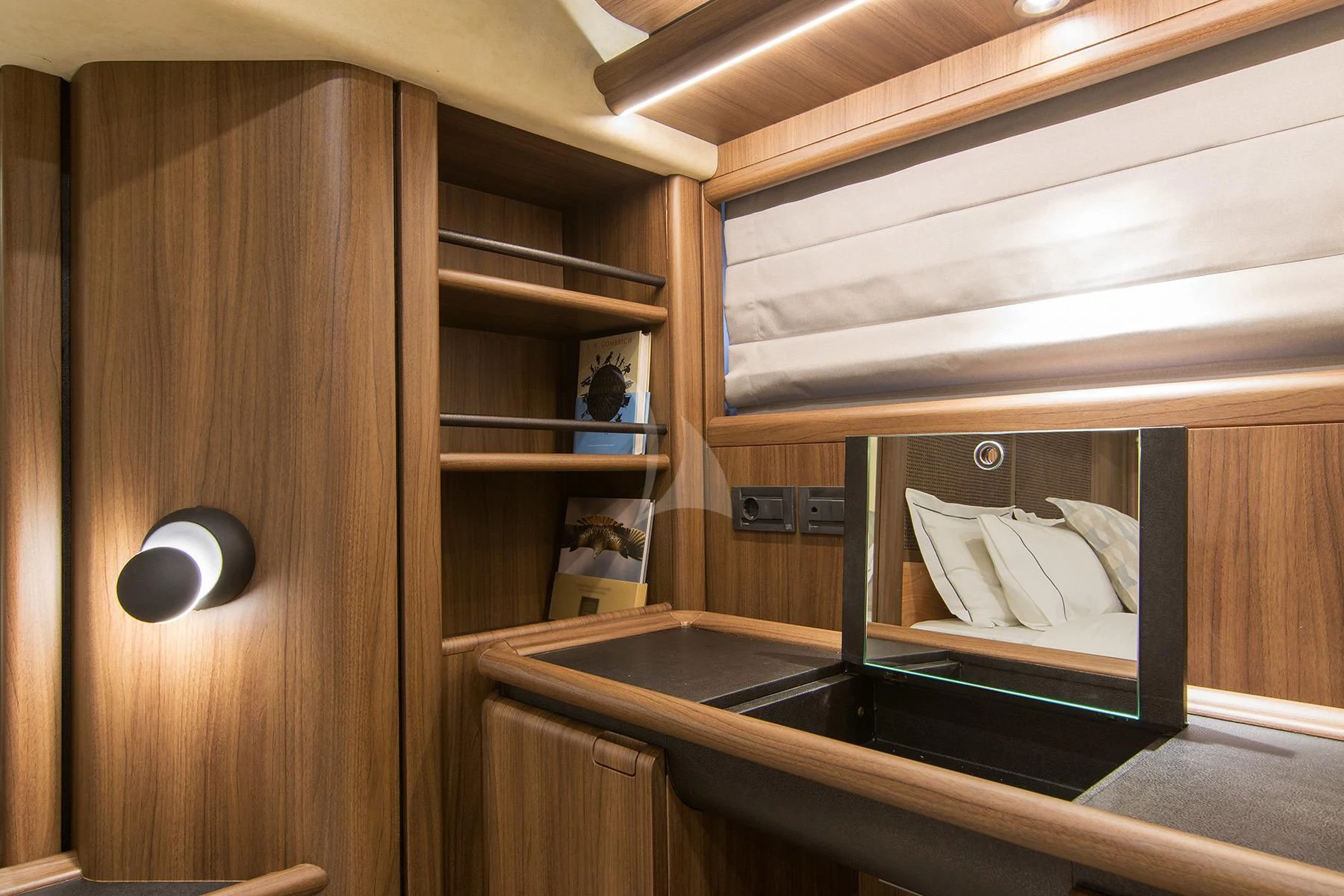 a room with a wood cabinet and a sink aboard OXYGEN 8 Yacht for Charter