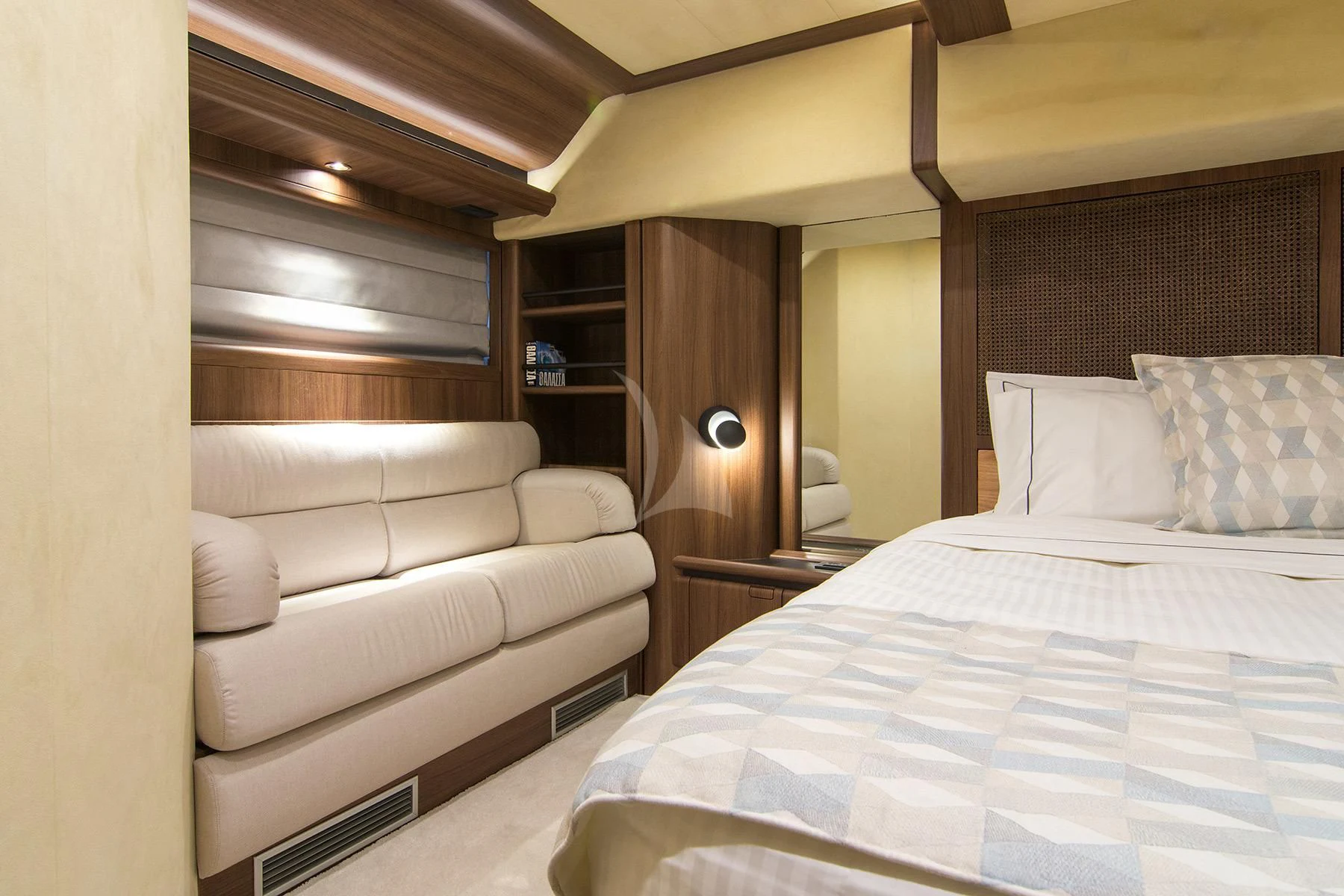 a room with a bed and a couch aboard OXYGEN 8 Yacht for Charter