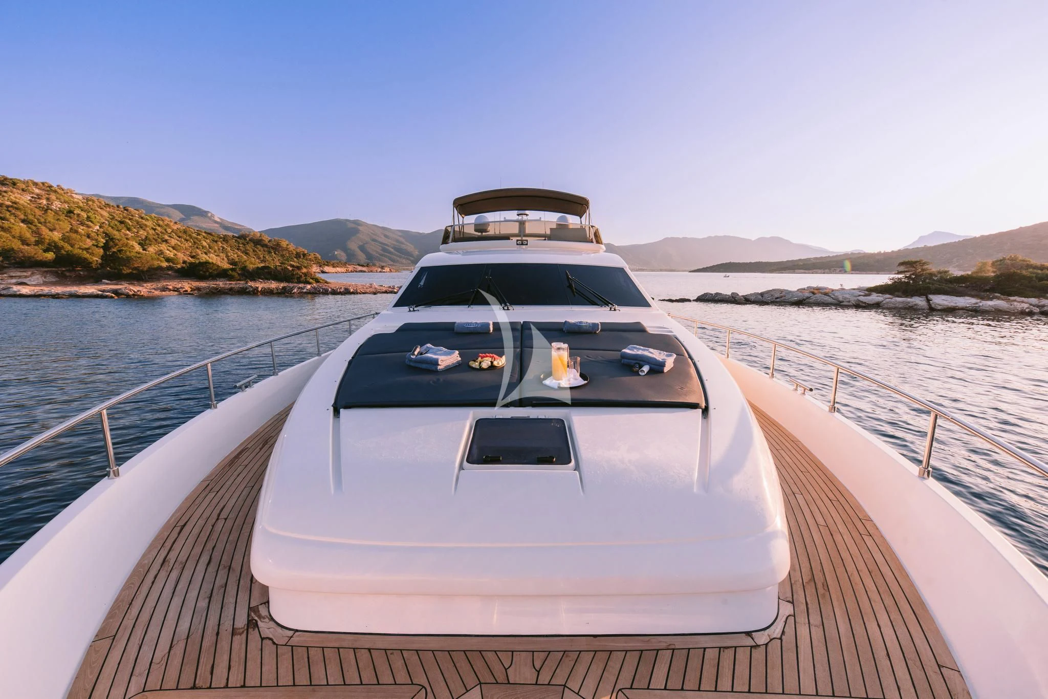 a boat on a water way aboard OXYGEN 8 Yacht for Charter