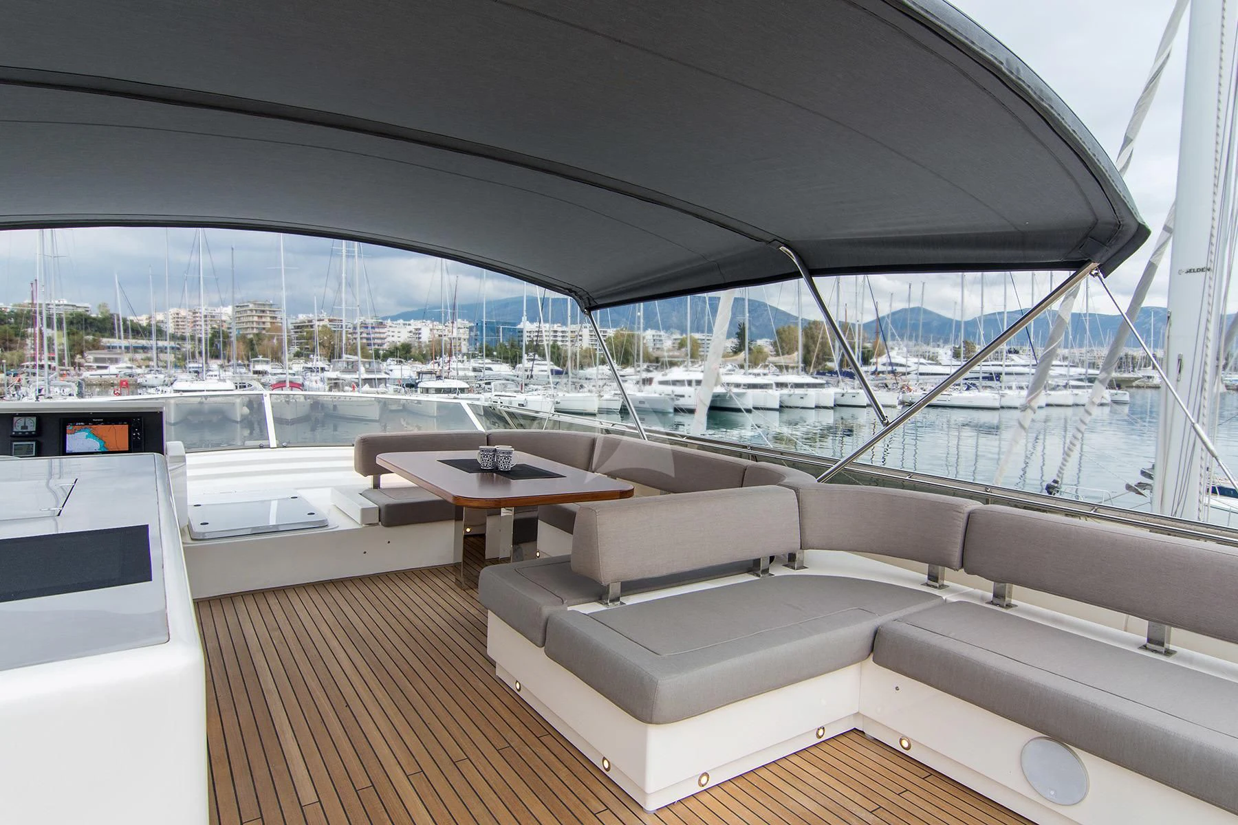 a room with a table and couches aboard OXYGEN 8 Yacht for Charter