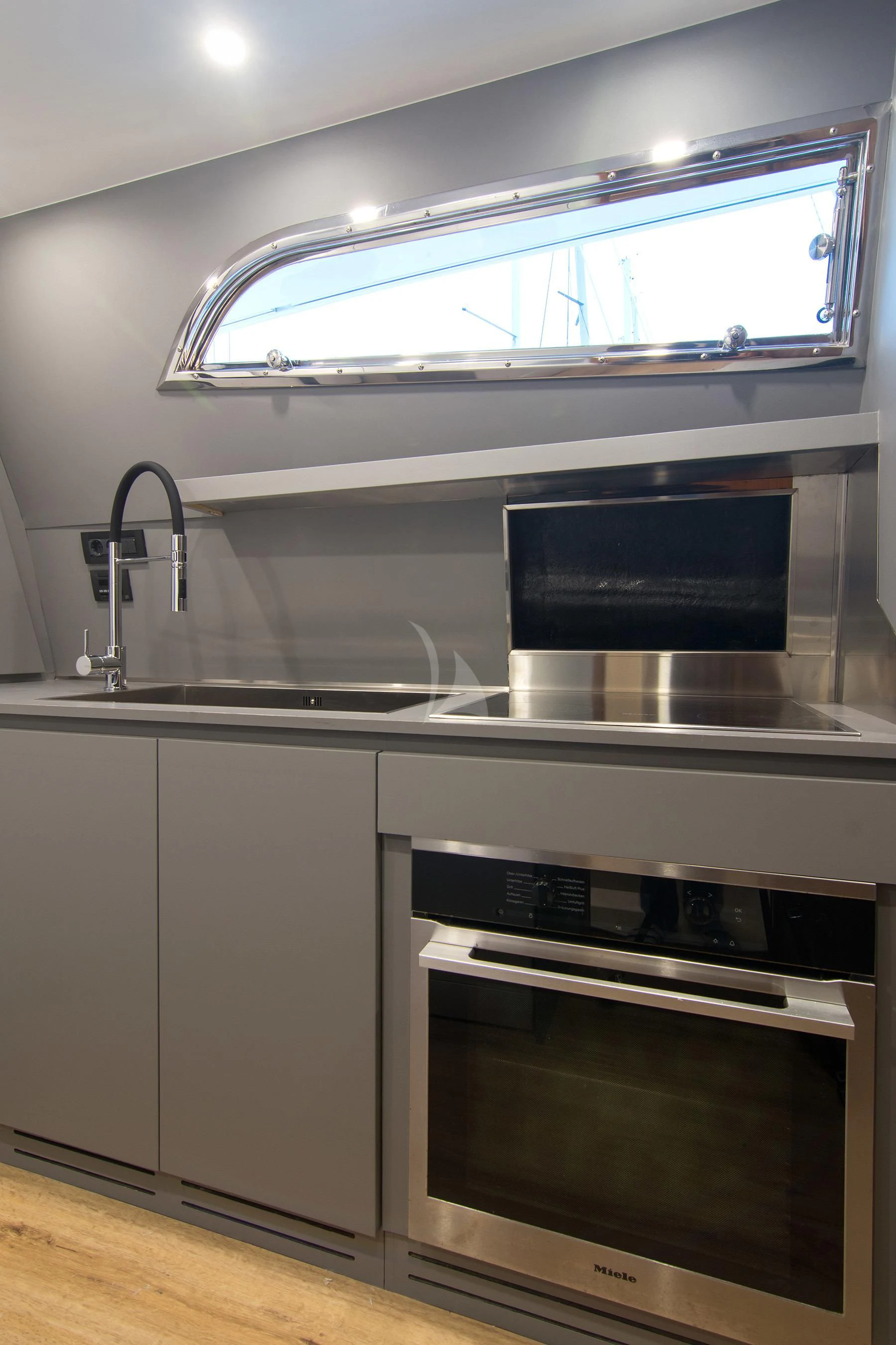 a kitchen with a steel oven aboard OXYGEN 8 Yacht for Charter