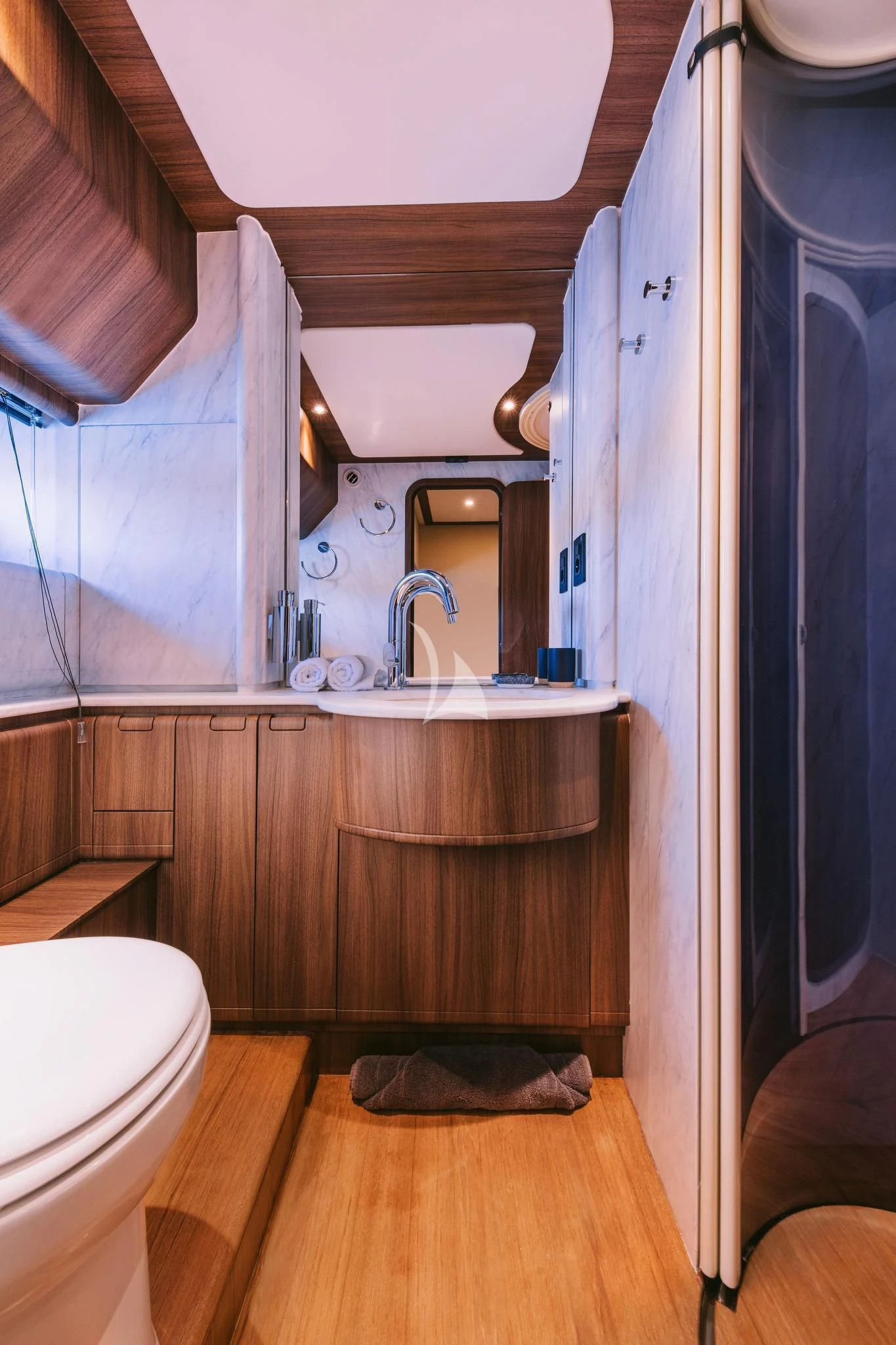 a bathroom with a sink and a toilet aboard OXYGEN 8 Yacht for Charter
