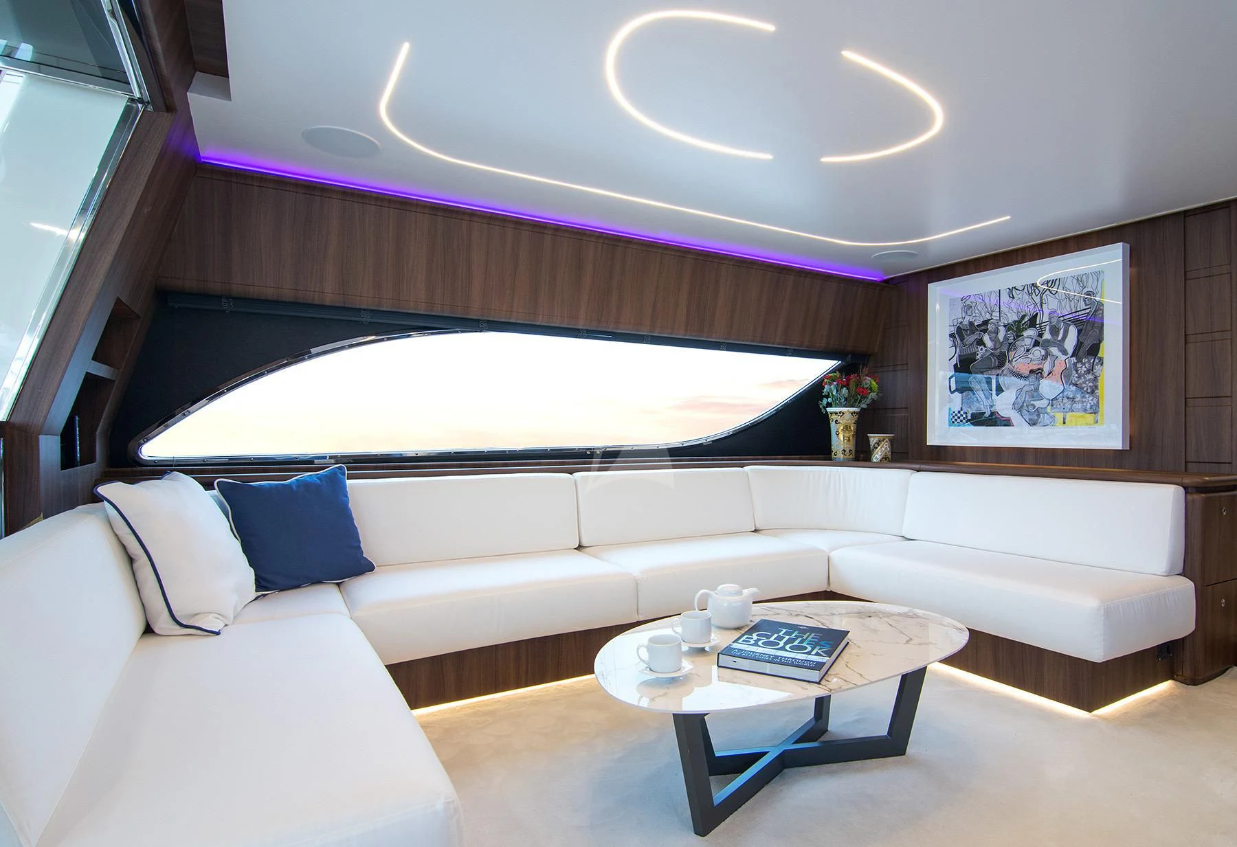 a room with a couch and a table aboard OXYGEN 8 Yacht for Charter