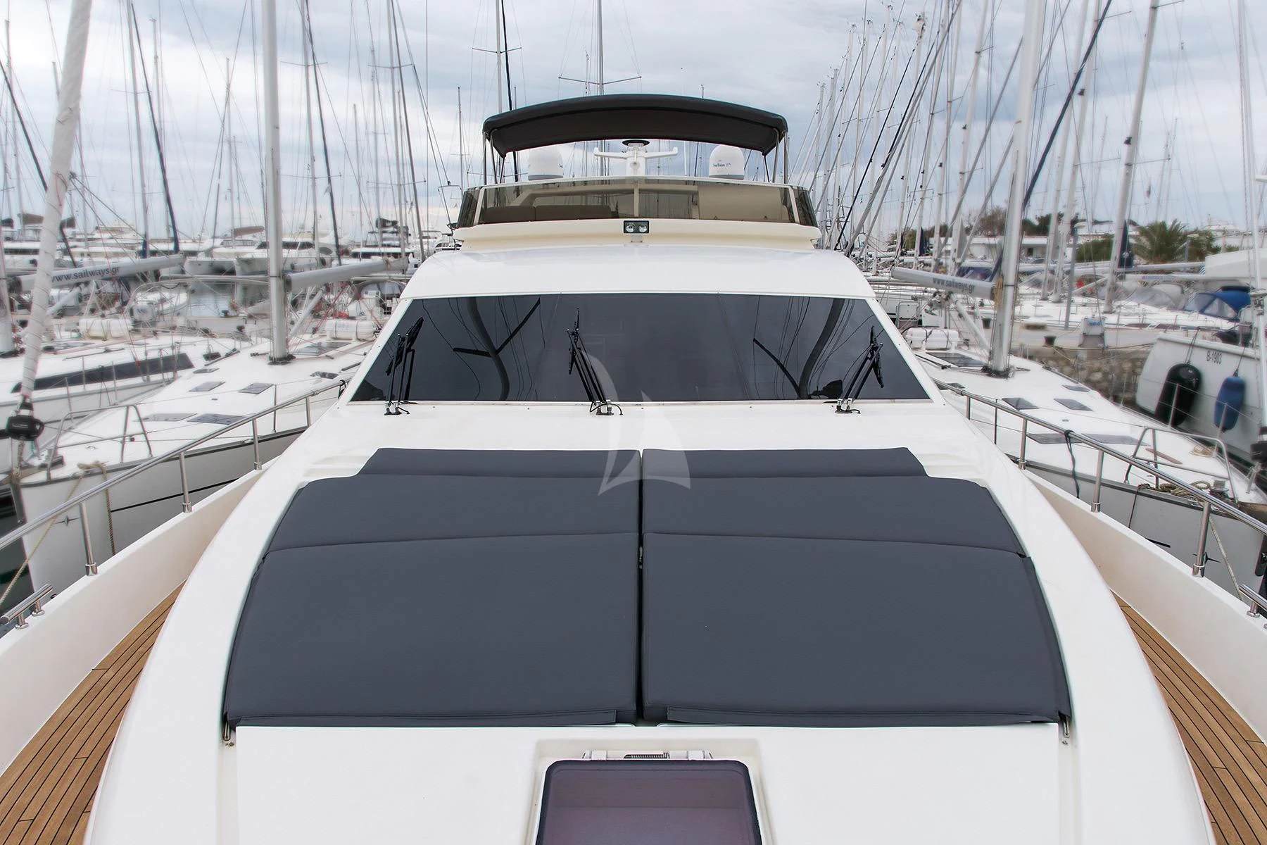a white yacht on a dock aboard OXYGEN 8 Yacht for Charter