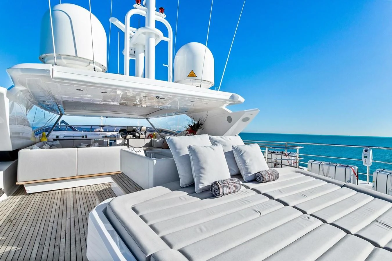 a large white ship docked aboard SUNSET Yacht for Sale