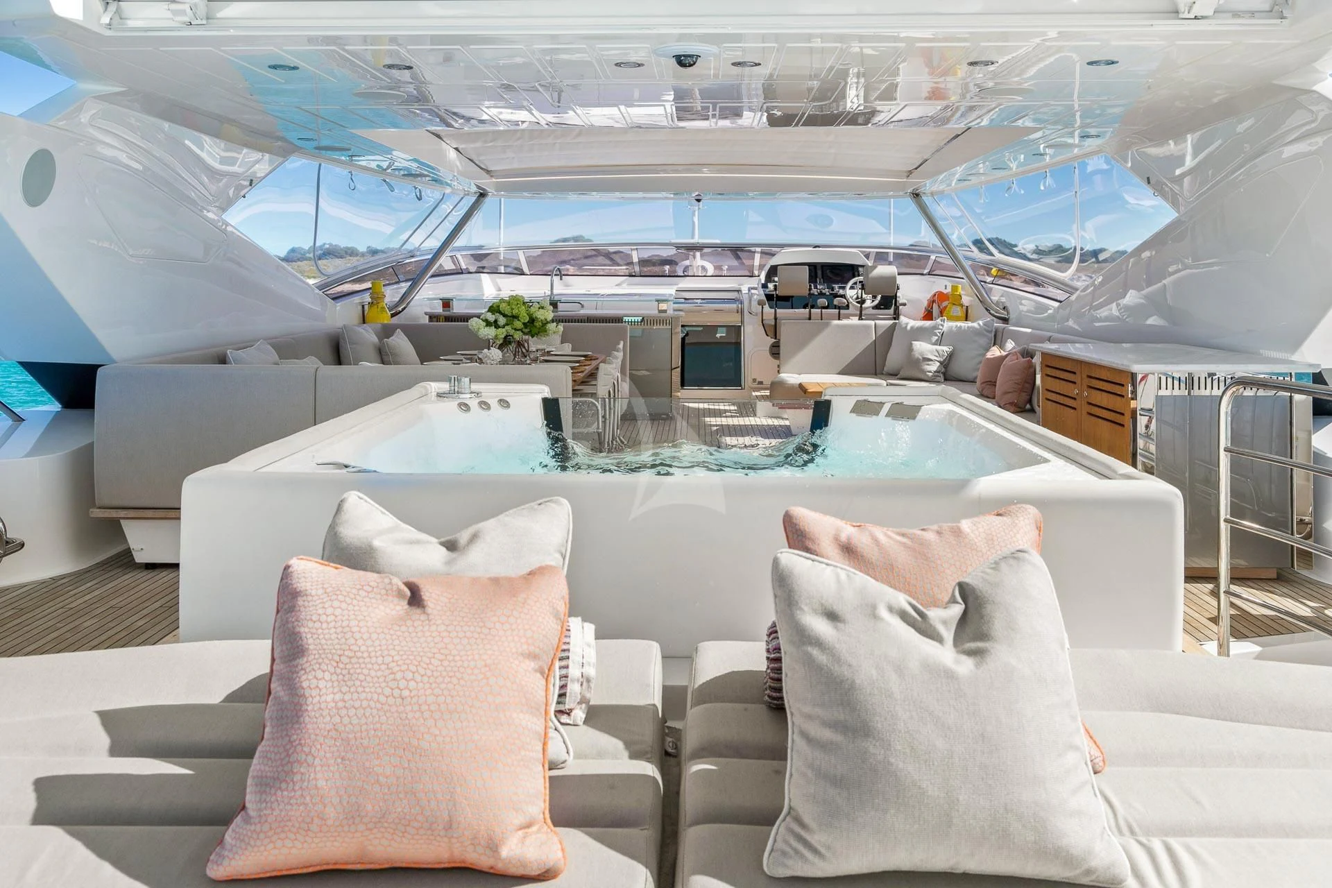 a room with chairs and a table aboard SUNSET Yacht for Sale