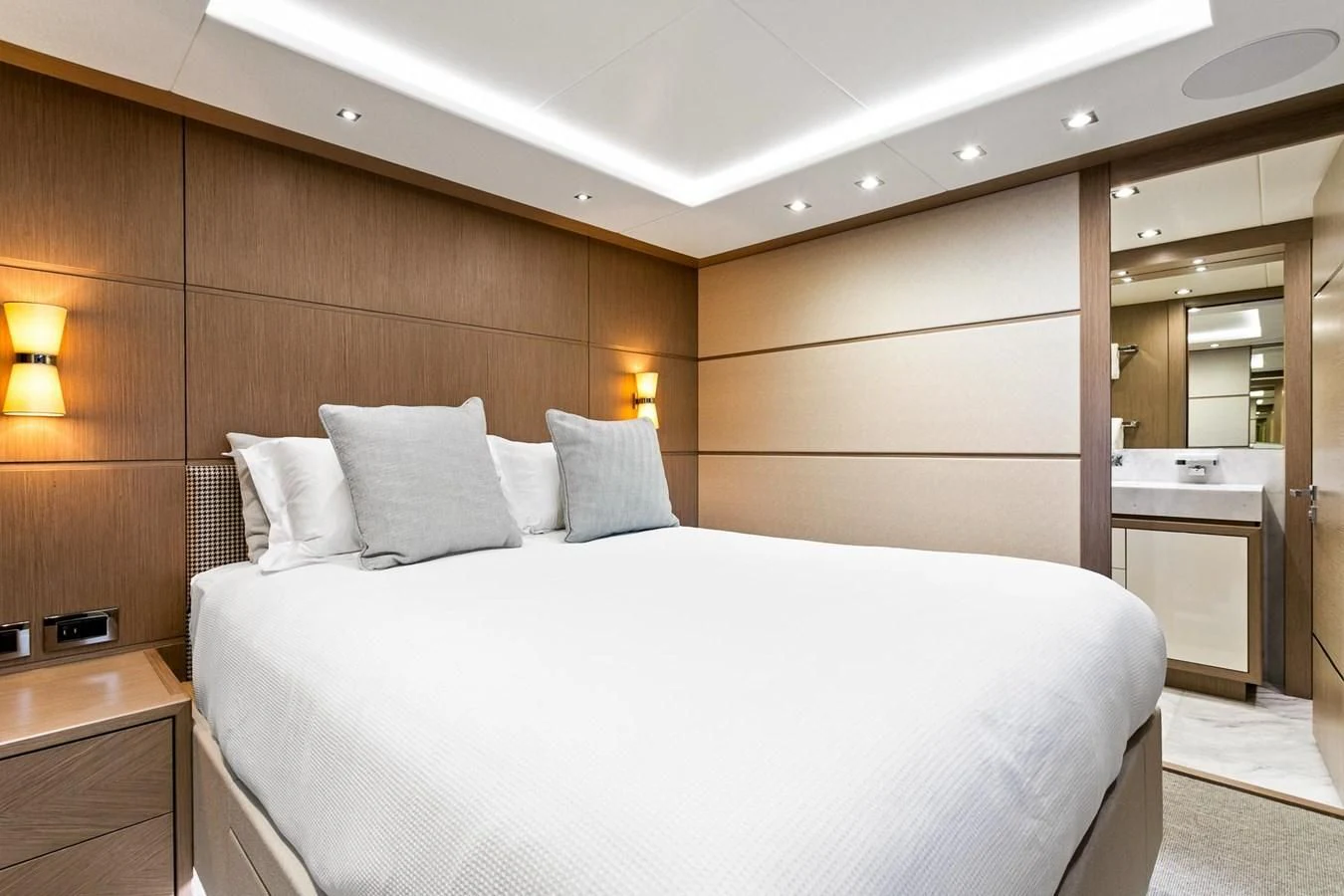 a bed in a room aboard SUNSET Yacht for Sale
