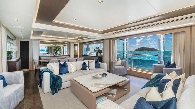 a living room with a large window aboard SUNSET Yacht for Sale