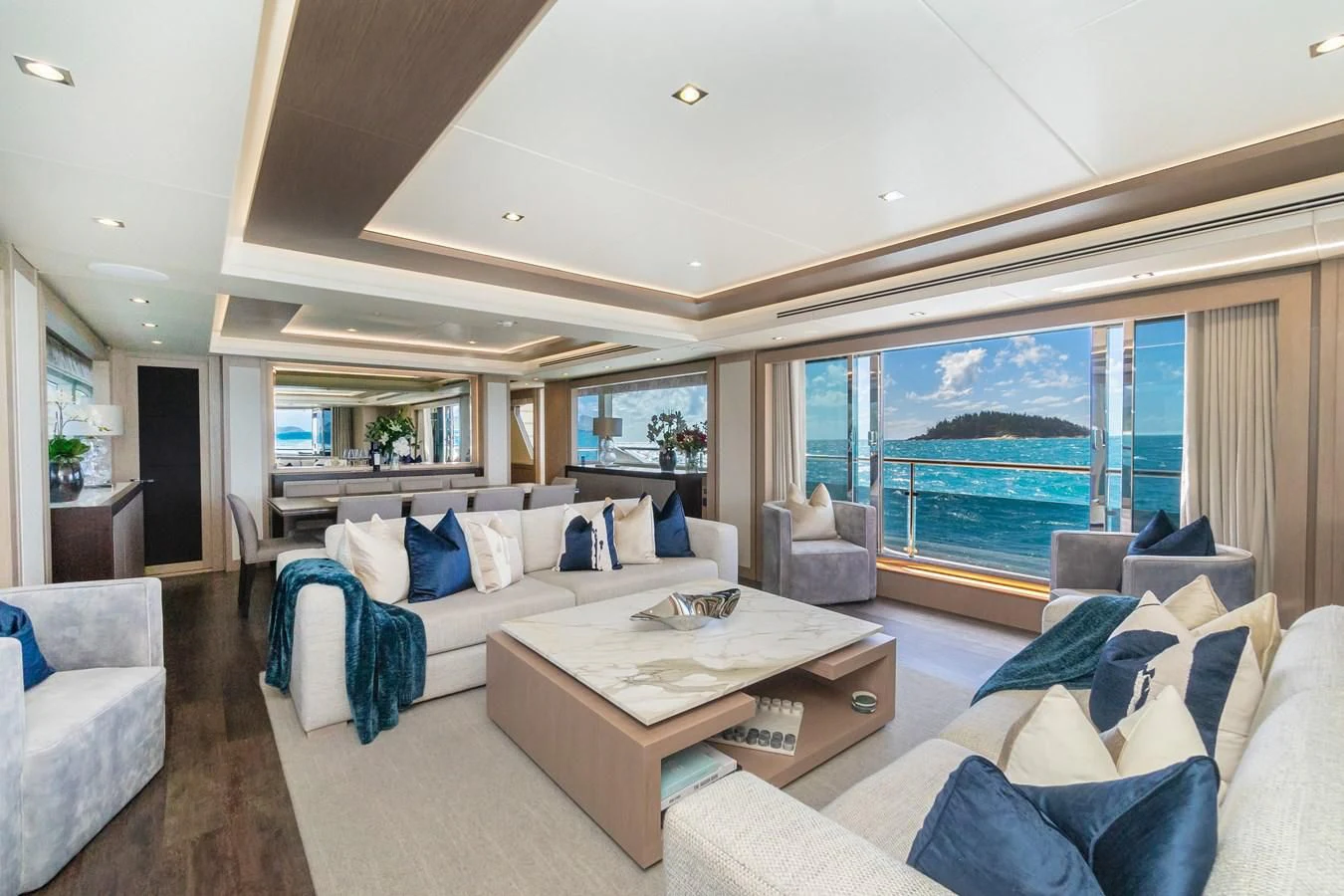 a living room with a large window aboard SUNSET Yacht for Sale