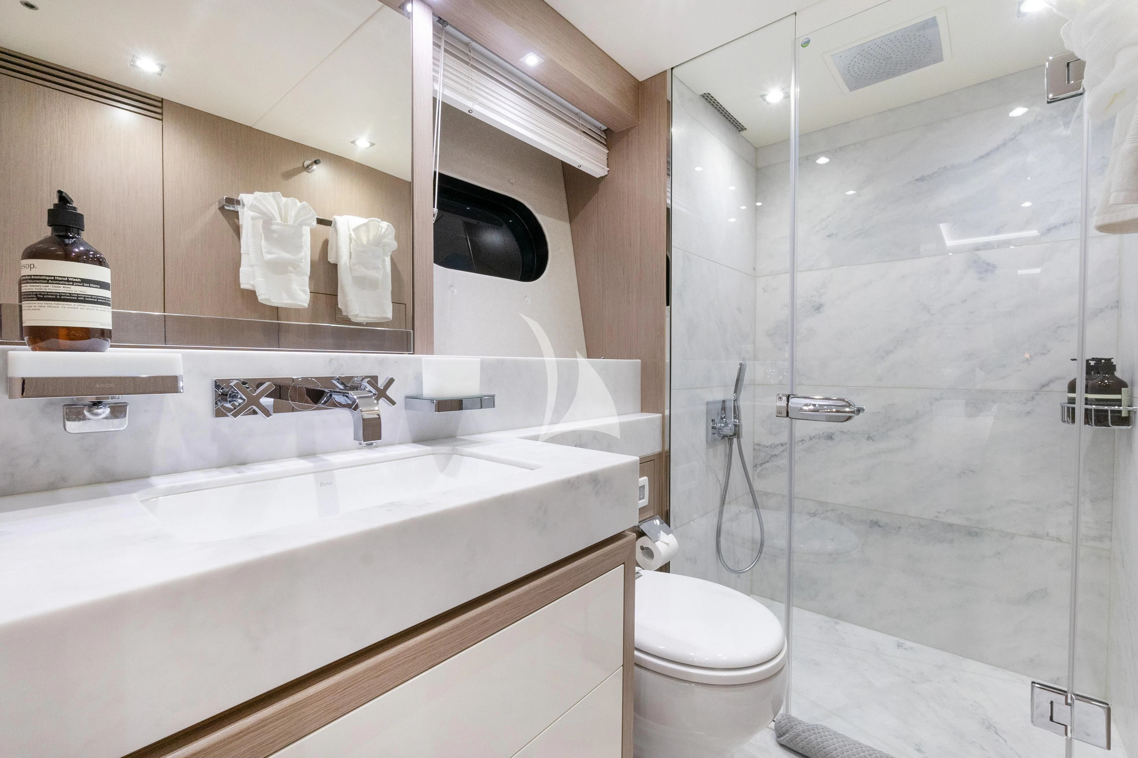 a bathroom with a glass shower aboard SUNSET Yacht for Sale