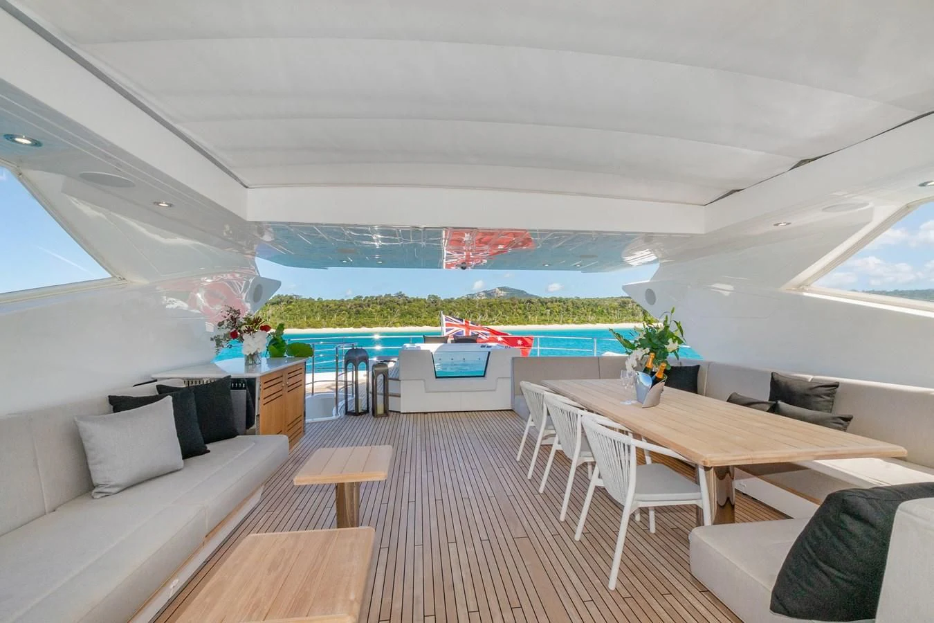 a living room with a large window aboard SUNSET Yacht for Sale
