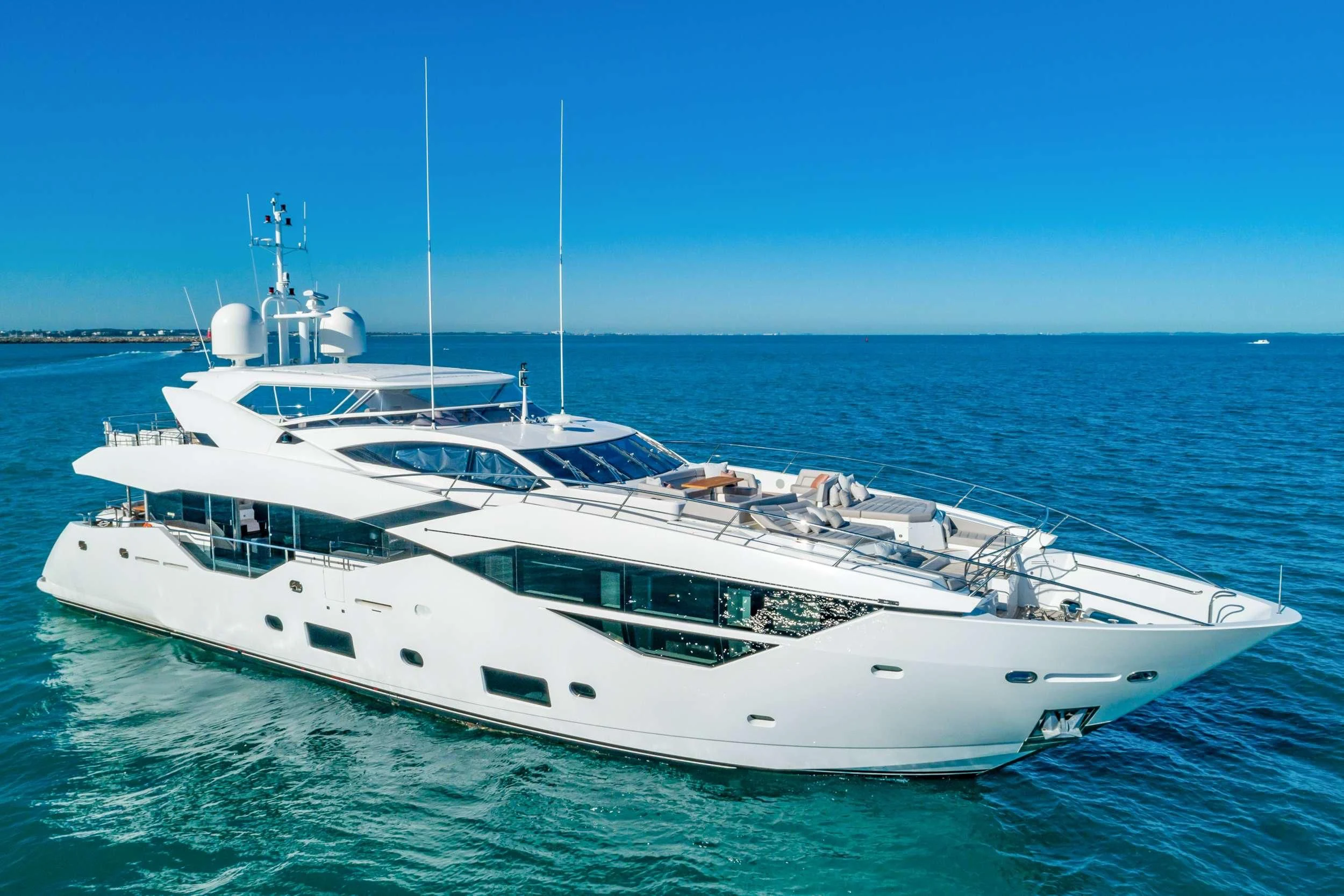a white yacht in the water aboard SUNSET Yacht for Sale