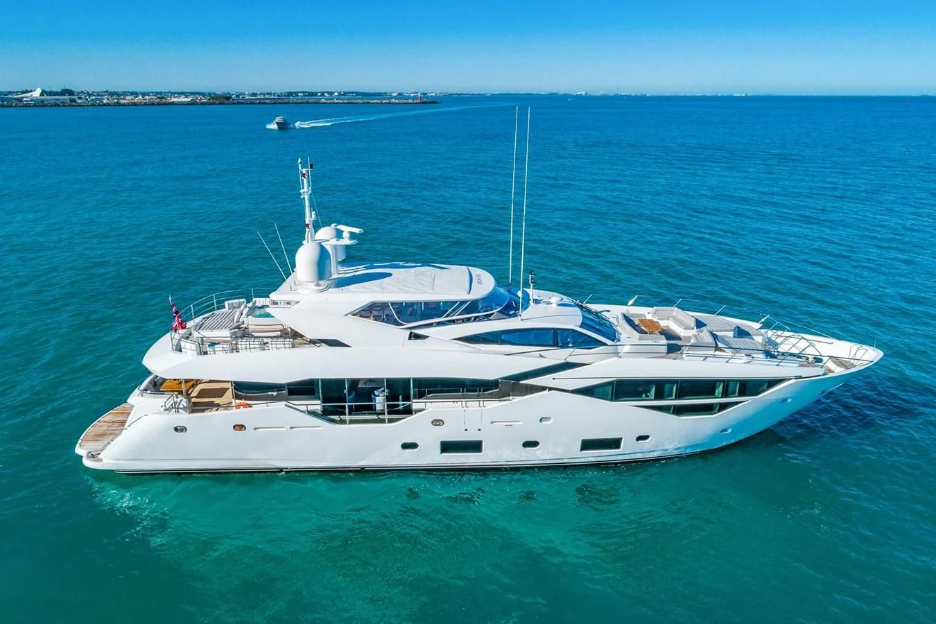 a white yacht in the water aboard SUNSET Yacht for Sale