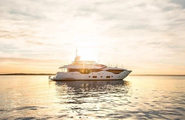 a large white ship in the water aboard SUNSET Yacht for Sale