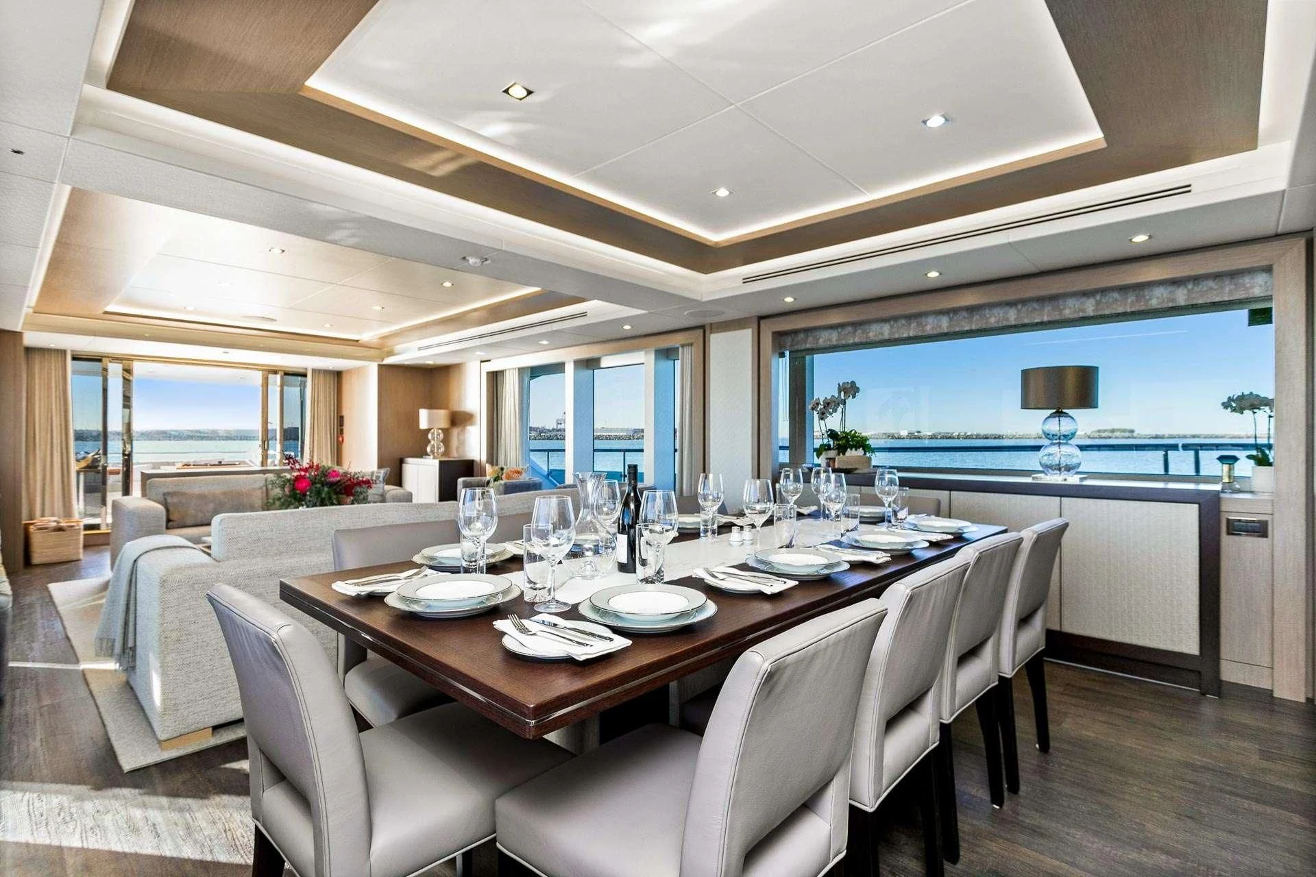 a dining room with a large table aboard SUNSET Yacht for Sale