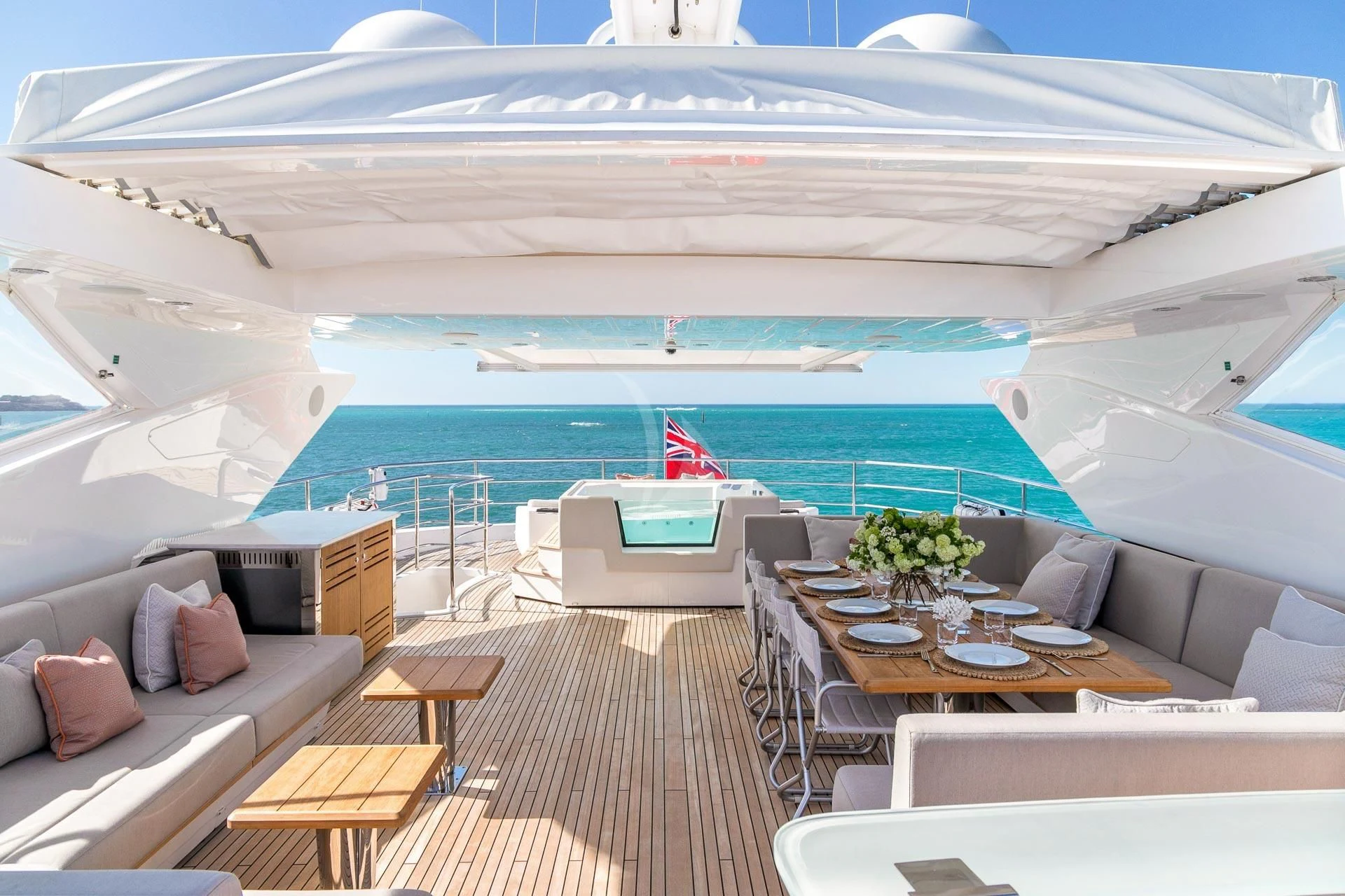 a room with a couch and a pool aboard SUNSET Yacht for Sale