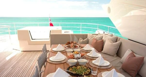 a table with food on it aboard SUNSET Yacht for Sale