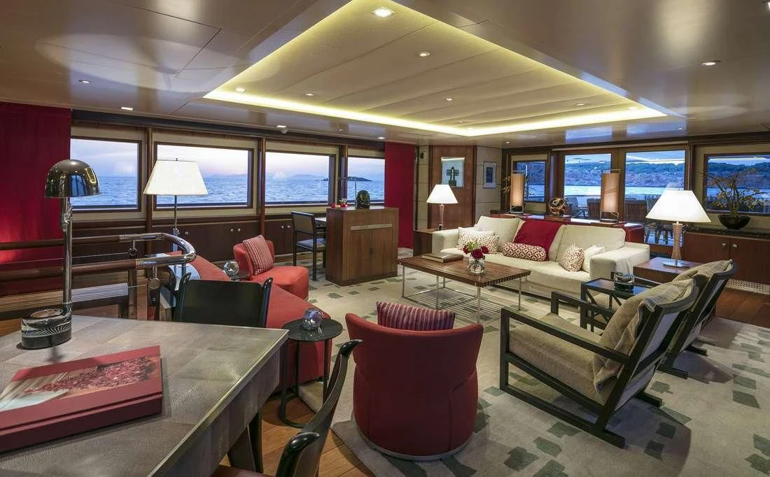 a living room with a large window aboard PEGASUS Yacht for Charter