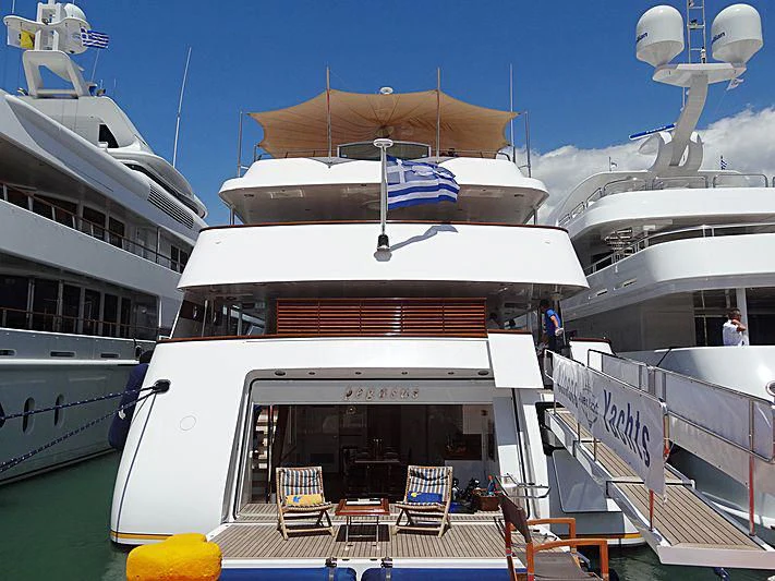 a boat docked at a pier aboard PEGASUS Yacht for Charter