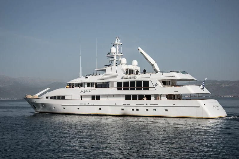 a large white ship in the water aboard PEGASUS Yacht for Charter