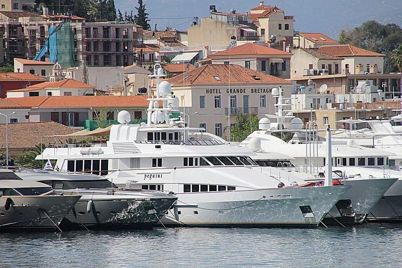 a group of boats in a harbor aboard PEGASUS Yacht for Charter