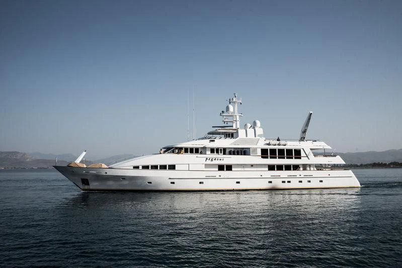 a large white ship in the water aboard PEGASUS Yacht for Charter