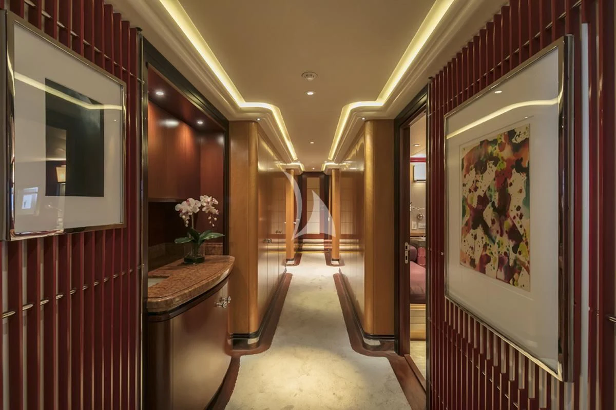 a hallway with red doors aboard PEGASUS Yacht for Charter