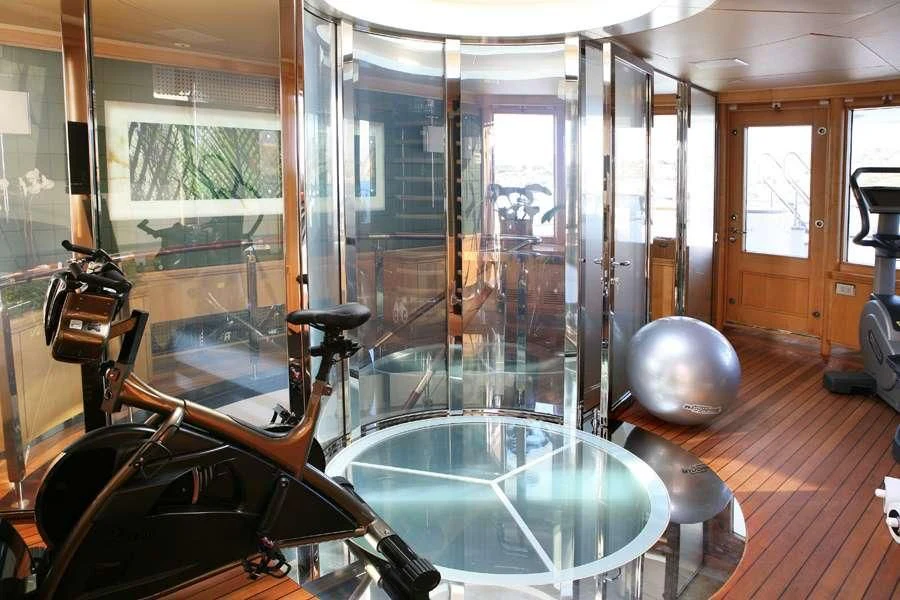 a room with a large mirror aboard PEGASUS Yacht for Charter