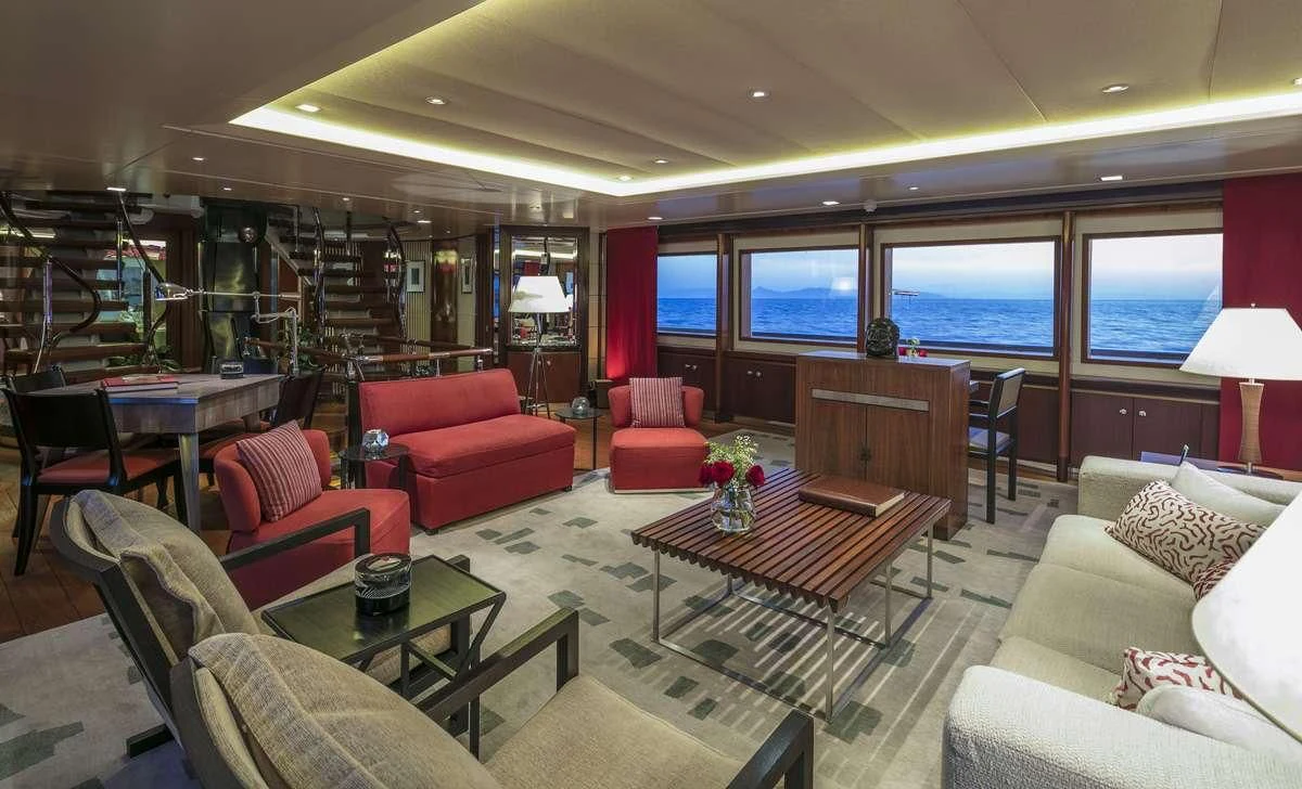 a living room with a large screen aboard PEGASUS Yacht for Charter
