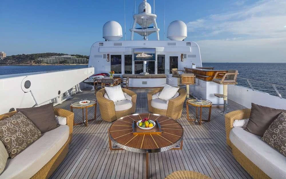 a large boat on a body of water aboard PEGASUS Yacht for Charter